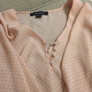Pink and white polka dot blouse